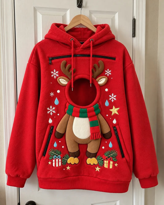 Red fleece Paw Hoodie on a wooden hanger: reindeer applique with antlers and a red-and-green striped scarf around a round head opening, plus a horizontal chest zip and two side zip pockets